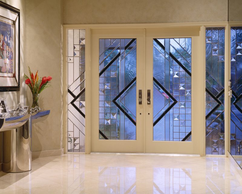 Entryway with black, clear, and clear textured glass in a Contemporary style.