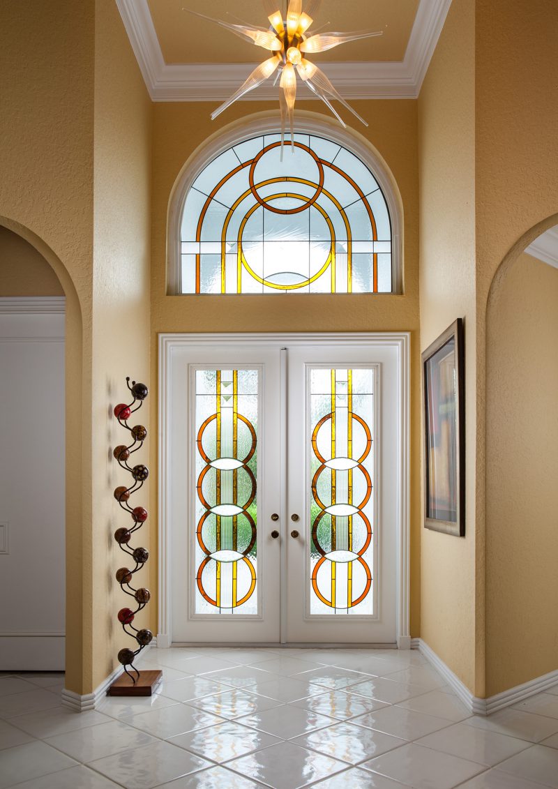 Entryway with yellow, orange, and clear textured glass in a Contemporary style.