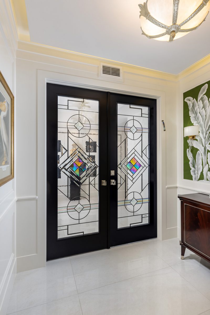 Contemporary entryway with Dichroic Bevels and clear glass.