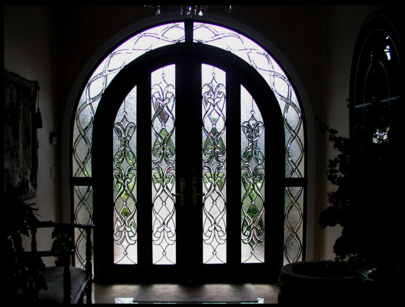 Entryway with clear, clear bevels, and clear textured glass in a Traditional style.