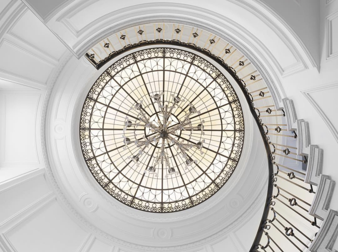 Ceiling dome with white and beige glass in a Traditional style.